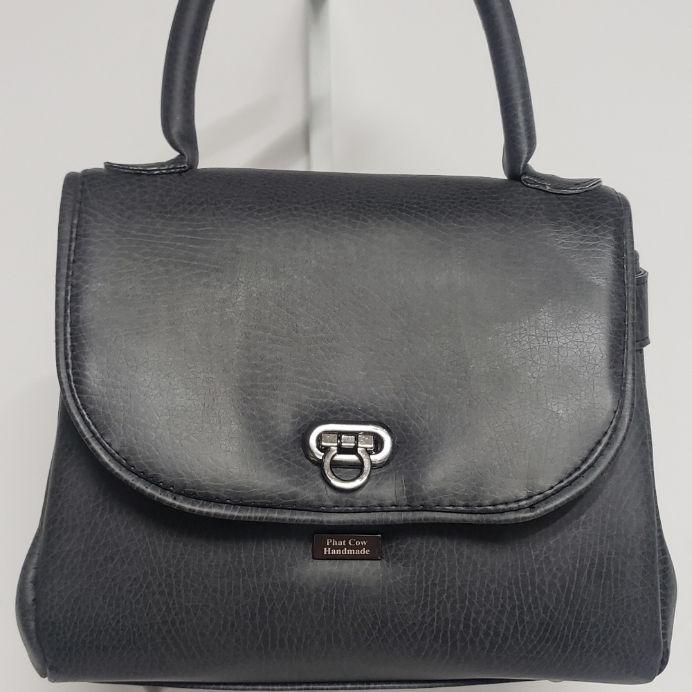 Handmade Black Rolked Top-Handle Mini Handbag.